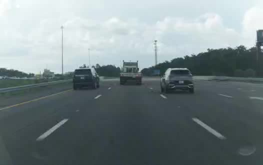 Kia EV6 forward-camera frame on an interstate